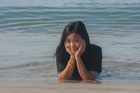 Shoot Asian woman portrait in lifestyle on the beach, Thailand.の写真素材