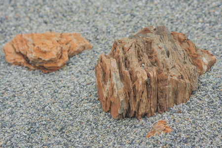 Big rock on mass of gravel stone for garden decoration.の写真素材