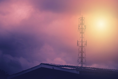 Television antenna with sunlight background in cloudy day.の写真素材