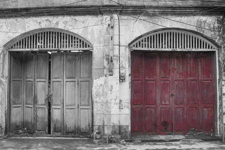 Architecture old purple wooden door with vintage buildings in European style.の写真素材