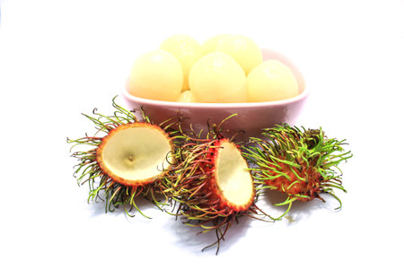 fresh rambutan peeled on white background の写真素材