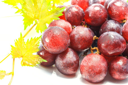 fresh red grape on white background の写真素材
