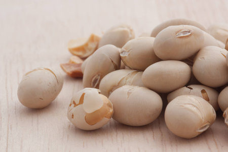 Soy beans on wood backgroundの写真素材