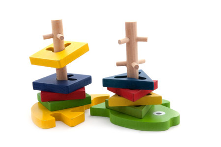 Colorful wooden domino toys for children advance learning an image isolated on whiteの写真素材