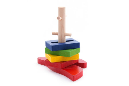 Colorful wooden domino toys for children advance learning an image isolated on whiteの写真素材
