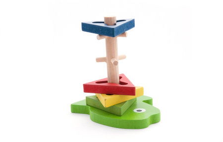 Colorful wooden domino toys for children advance learning an image isolated on whiteの写真素材