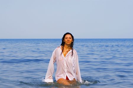 Pretty young woman on the seaの写真素材