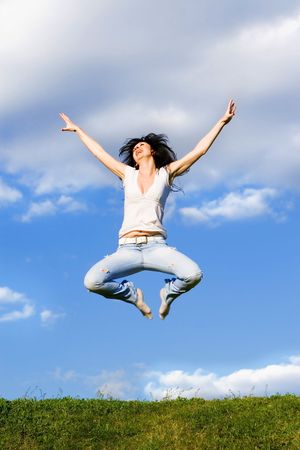 pretty young woman is jumping
