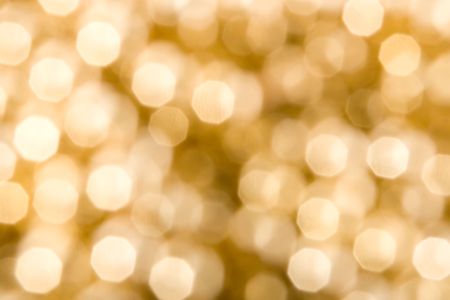 Christmas background with glowing lightsの写真素材