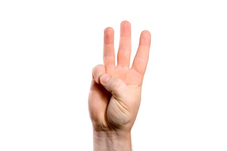 Male hand gesture isolated in white backgroundの写真素材