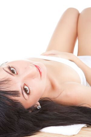 Cute woman relaxing in spaの写真素材