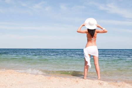 Young fashion woman on the beachの写真素材