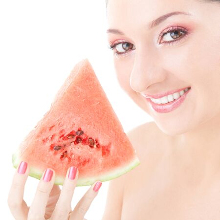 Cute woman with red watermelon on the white backgroundの写真素材
