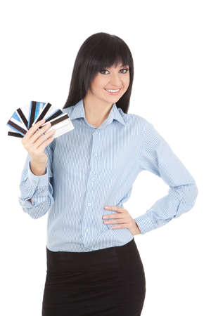 Young business woman with a bank cards, isolated on the white backgroundの写真素材