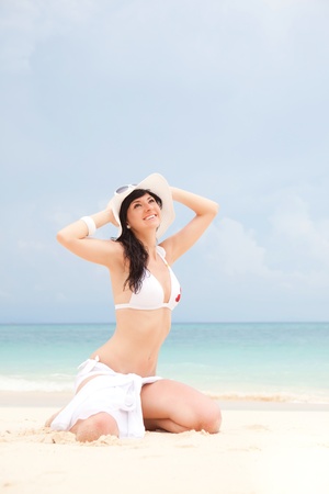 Young fashion woman on the beachの写真素材
