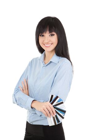 Young business woman with a bank cards, isolated on the white backgroundの写真素材