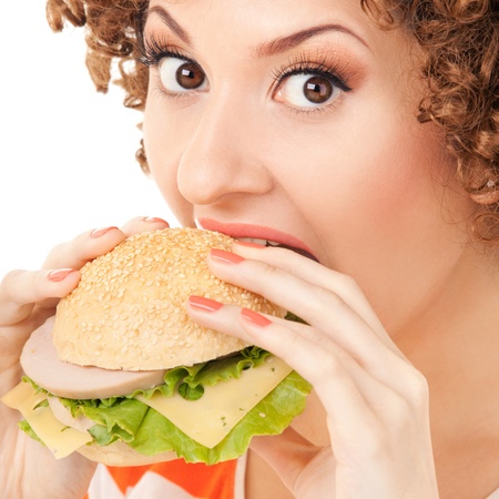 Fun woman with sandwich on the white backgroundの写真素材