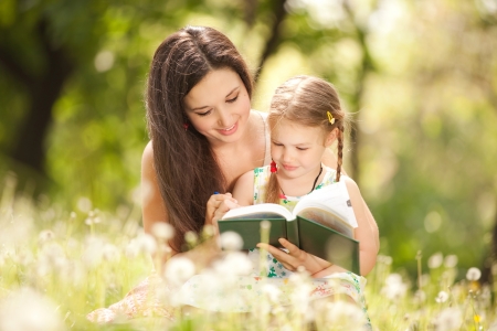Mother with daughter in the parkの写真素材