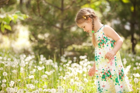 Cute little girl in the parkの写真素材