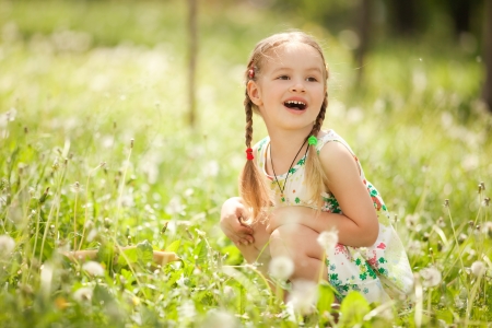 Cute little girl in the parkの写真素材