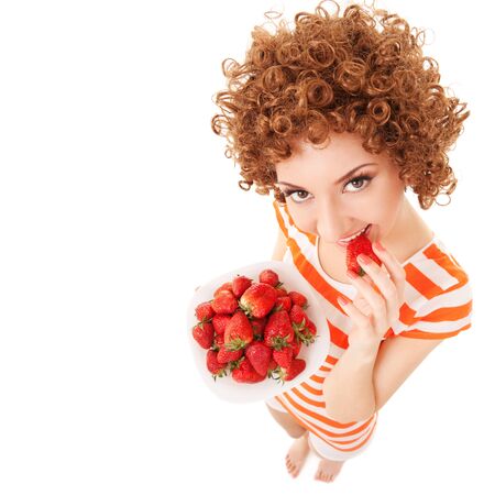 Fun woman with strawberry on the white backgroundの写真素材