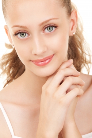 Portrait of young beautiful woman on white backgroundの写真素材