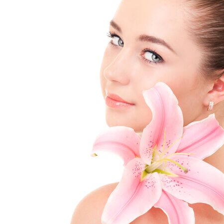 Cute woman with flowerの写真素材