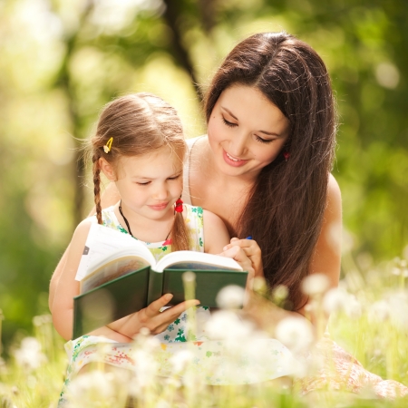 Mother with daughter in the parkの写真素材