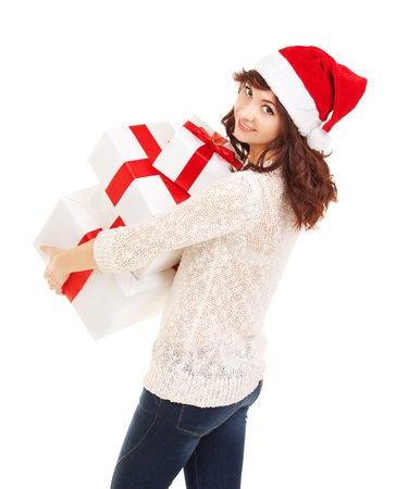 Happy santa woman with gift boxesの写真素材