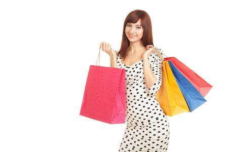 Pretty woman with shopping bagsの写真素材