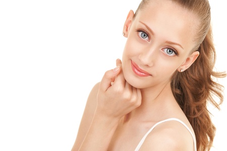 Portrait of young beautiful woman on white backgroundの写真素材