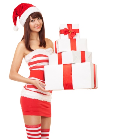 Happy santa woman with gift boxesの写真素材