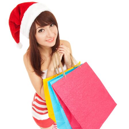 Fun santa woman with packagesの写真素材