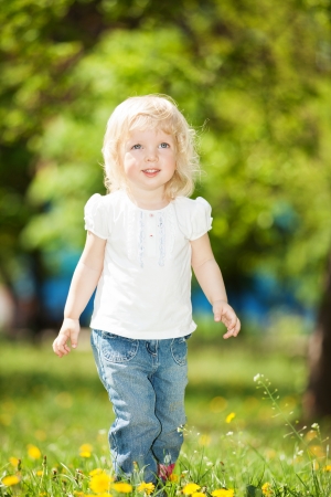 Cute little girl in the parkの写真素材