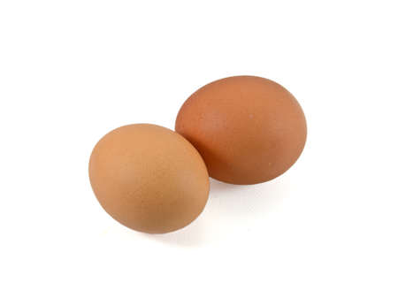 two eggs are isolated on a white background