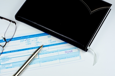 classic pen on deposit slipの写真素材