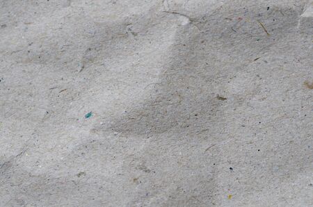 Textured obsolete crumpled packaging brown paper backgroundの写真素材