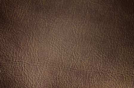 Tan leather texture background. Close-up photo