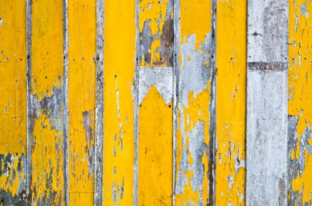yellow painted planks as backgroundの写真素材