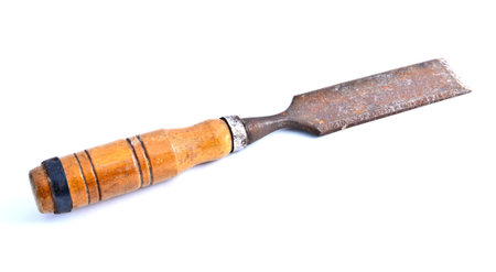 old rusty chisel isolated on a white background