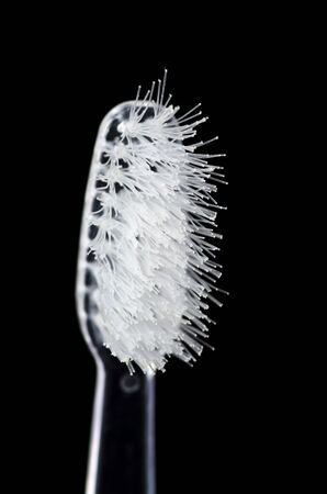 Old toothbrush. isolated on black