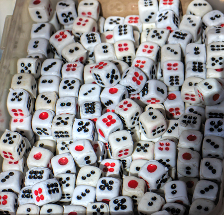 Dice. Plastic dice pile as board game or gambling concept.