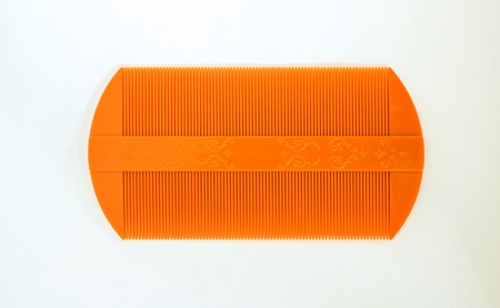 Lice comb isolated on a white backgroundの写真素材