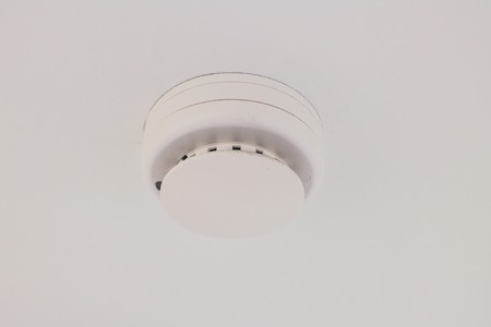 smoke detector on a ceiling