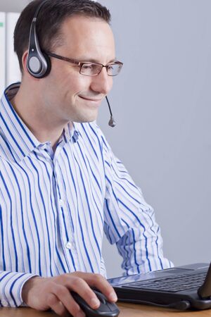 friendly, happy customer support operator at work
