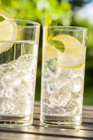 cold summer drinks in gardenの写真素材