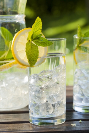cold summer drinks in gardenの写真素材