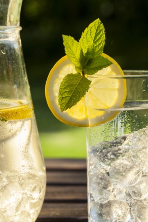 cold summer drinks in gardenの写真素材