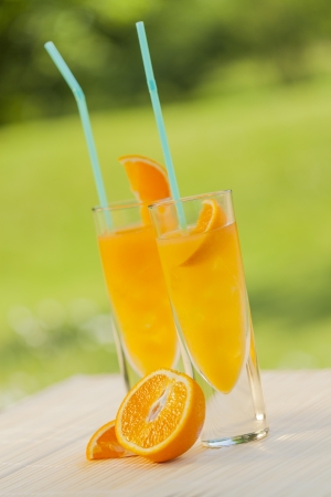 cold summer drinks in gardenの写真素材