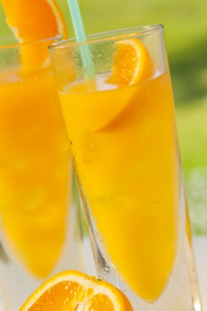 cold summer drinks in gardenの写真素材